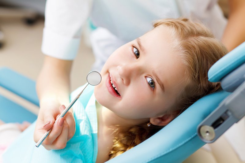 37280-bigstock-little-girl-visiting-dentist-35934937.jpg